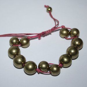 Pink and brass beaded adjustable bracelet